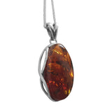 Inti Amber Silver Pendant and chain .
