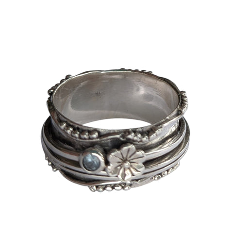 Daisy Blue Topaz Silver Spinning Ring