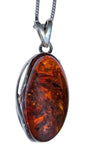 Inti Amber Silver Pendant and chain .