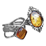 Amber Rings in oxidised Silver settings