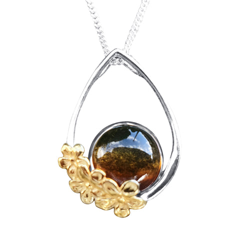 Floral Amber Pendant with gold accent